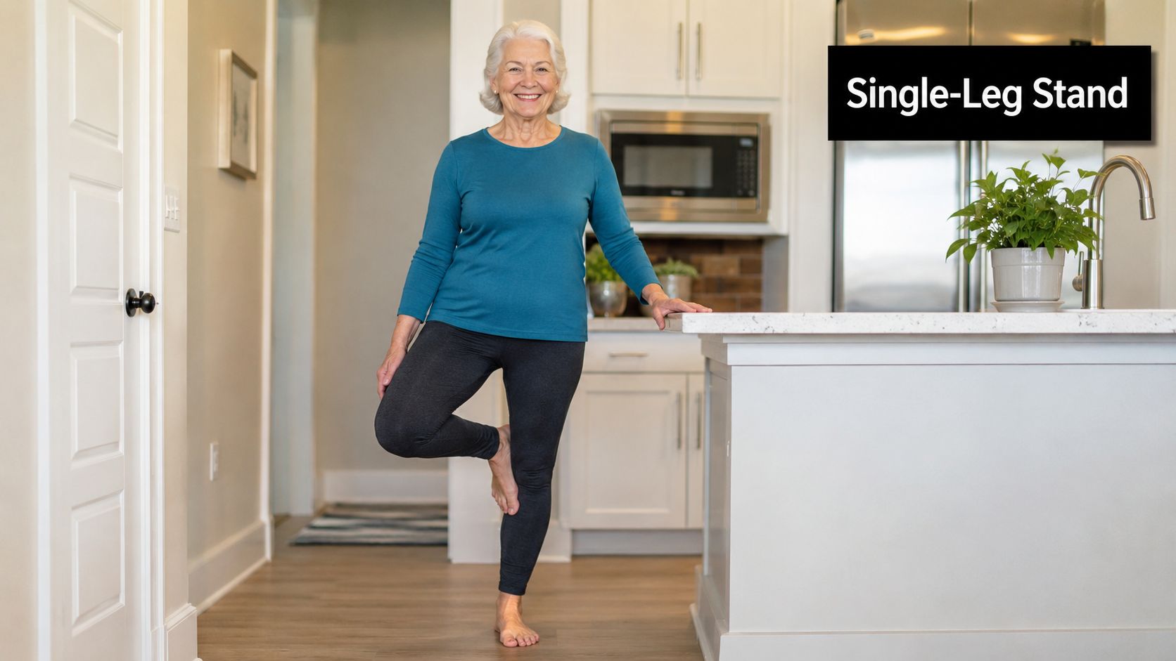 An older woman performing a single-leg stand exercise while holding onto a kitchen counter for support.