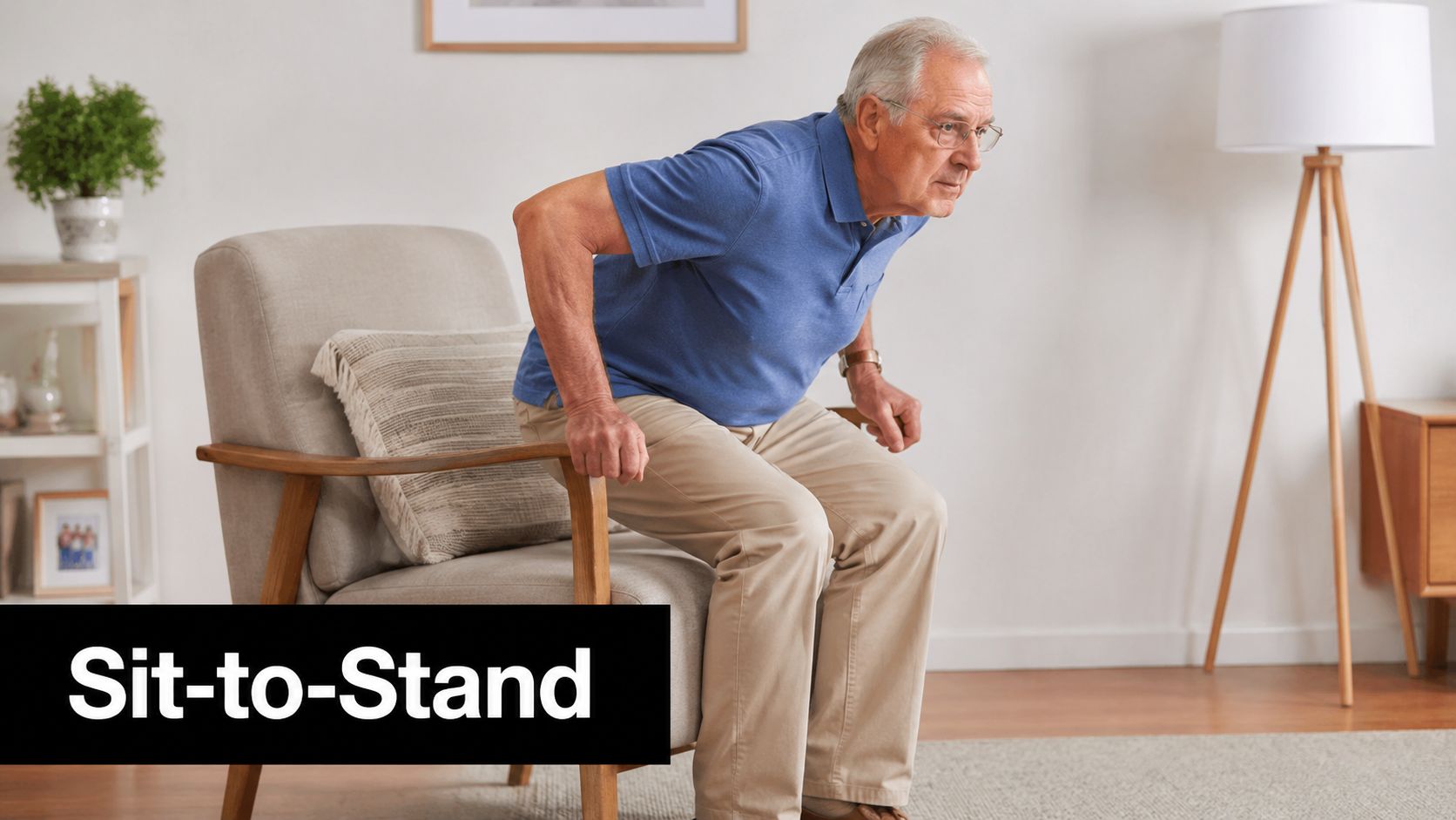 An older man in a blue shirt performing a sit-to-stand exercise from a chair in his home.
